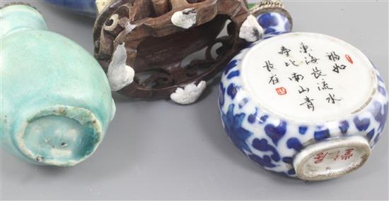 Three Chinese porcelain snuff bottles, 19th / early 20th century, 4.3cm - 7cm excluding stoppers and stands